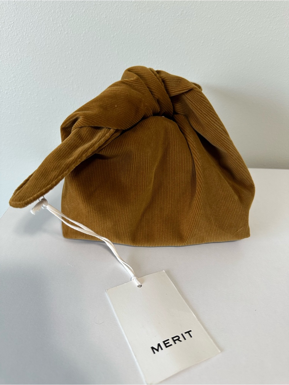 MERIT Knotted Corduroy Cosmetic Pouch in Camel Brown